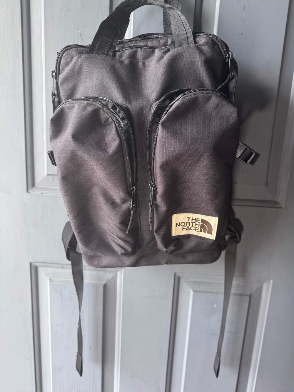 The North Face Mini Crevasse Black Backpack with Dual Front Pouches